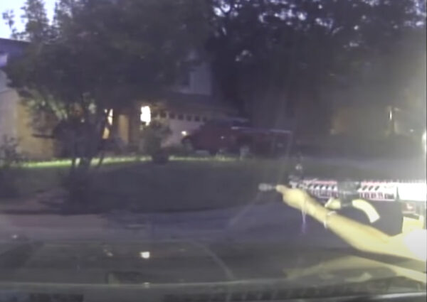 Video footage shows naked man shout obscenities, point rifle at officers before police shot him 1 point rifle