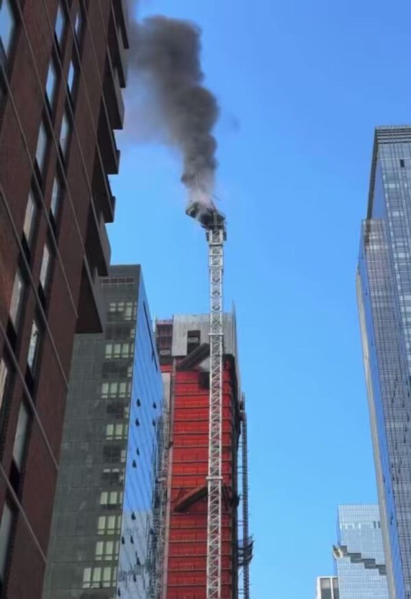 Video: Crane on fire partially collapses in New York City