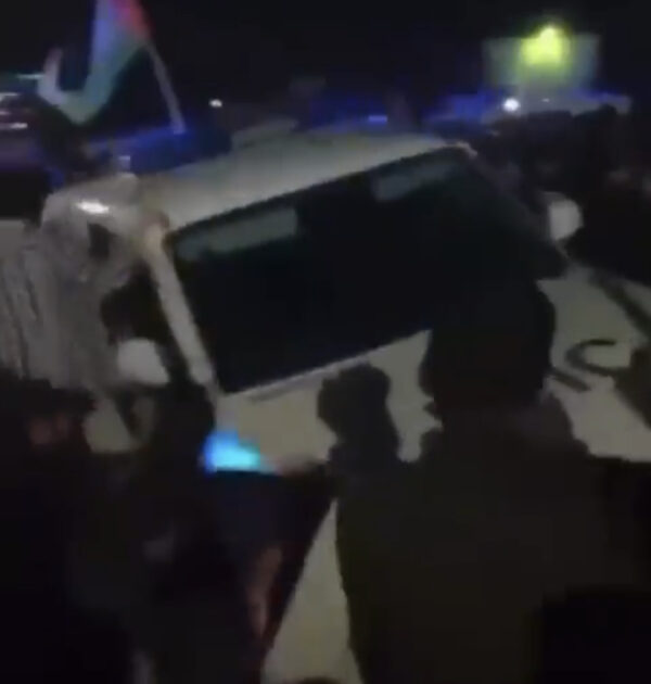 The crowd at the Makhachkala airport is attacking patrol cars