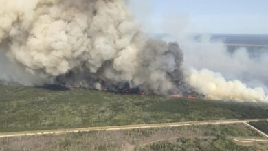 Manitoba Urges Tourists to Reconsider Visits as Wildfire Evacuations Surge to 21,000