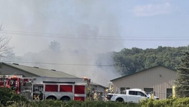Lowell Plane Crash: New Photos Show Impact at Storage Facility Near Airport