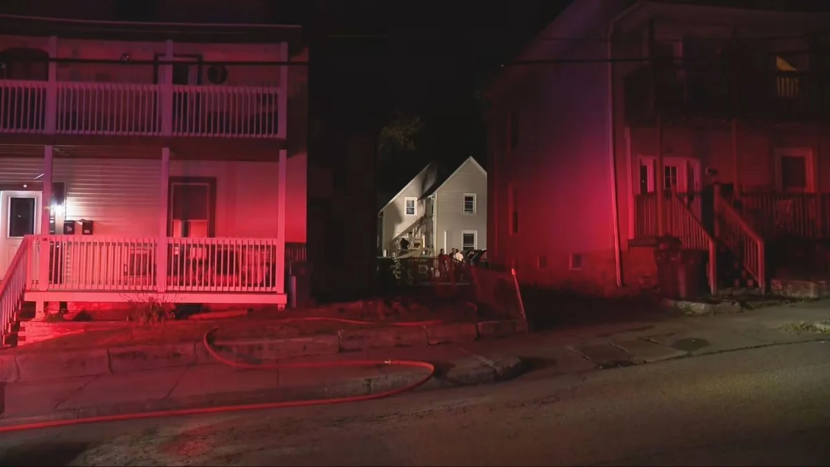 Firefighters help trapped residents escape first-floor fire on Grove Street in Woonsocket 1 Firefighters help trapped