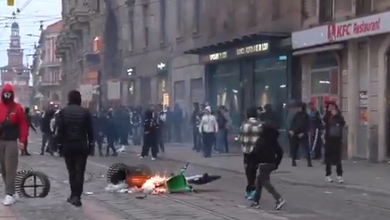 Un centinaio di persone accompagnate in Questura a Milano, in Italia, tra vetrine infrante e saccheggi (Video)